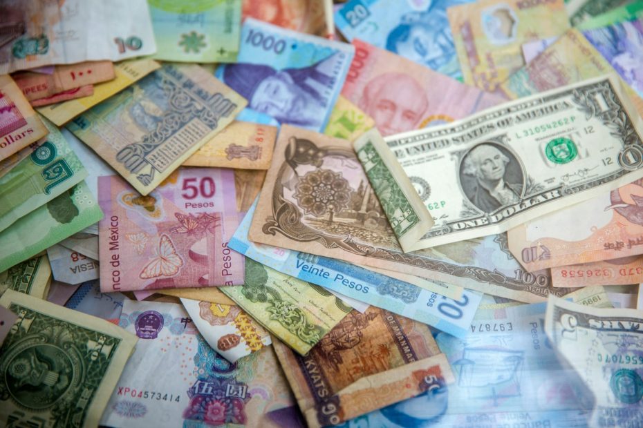A spread of banknotes from different countries